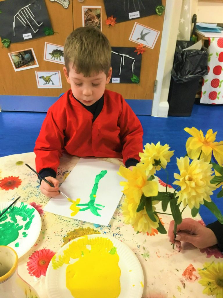 Young children engaged in nursery learning activities at Vita et Pax Preparatory School, Southgate